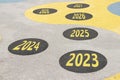 The years from 2023 to 2028 are written on the road in circles on the playground on the floor in Ukraine, achievements