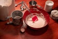 Yeast bread dough in a bowl with flour, yeast, sugar and flour sieve on kitchen table. Preparation of homemade bread. Royalty Free Stock Photo