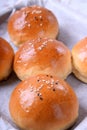 Yeast buns with sesame seeds