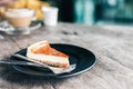 Yeast cake on a black plate