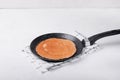 Yeast crepe with rye flour on the frying pan