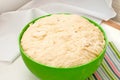 Yeast dough rises in a bowl Royalty Free Stock Photo