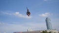 Yekaterinburg, Russia-August, 2019: Cyclist performs stunt on ramp. Action. Young man on bicycle performs dangerous