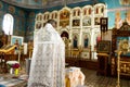 Yekaterinburg, Russia - July 2019. Baby baptism in the church. Holy Orthodox rite of baptism of a newborn in a small wooden