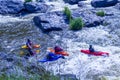 Yekaterinburg, Russia - June 8, 2019: Extreme whitewater rafting trip. A group of people team in kayaks practise traversing the Royalty Free Stock Photo