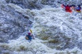 Yekaterinburg, Russia - June 8, 2019: Extreme whitewater rafting trip. A group of people team in kayaks practise traversing the Royalty Free Stock Photo