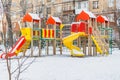 Yekaterinburg, Sverdlovsk Russia - 29 10 2018: A children`s playground with colored red blue yellow wooden houses and slides with