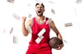 Basketball player Isolated On White with falling money