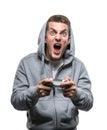 Yelling young man with joypad, isolated Royalty Free Stock Photo