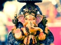 Yello Ganesh Elephant God in Hindusim mythology in rich king pos Royalty Free Stock Photo