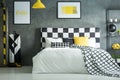 Yellow accent in dark bedroom Royalty Free Stock Photo