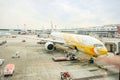 Yellow air plane of Nok Scoot parked at Don Mueang International Airport Royalty Free Stock Photo