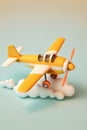 Yellow airplane flying over clouds Royalty Free Stock Photo