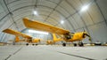 Yellow airplane glider in the hangar. Royalty Free Stock Photo