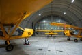 Yellow airplane glider in the hangar. Royalty Free Stock Photo