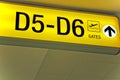 Yellow airport direction departure sign Royalty Free Stock Photo