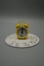 A yellow alarm clock over a disk with written,stress Royalty Free Stock Photo