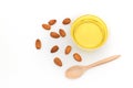 Yellow almond oil in a clear bowl