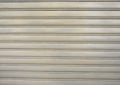 Yellow aluminium rolling shutter metal texture background Royalty Free Stock Photo