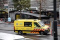 Yellow ambulance car with medical signs and 112 emergency call number on the street in Rotterdam, the Netherlands Royalty Free Stock Photo