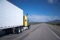 Yellow American semi-truck reefer transit Nevada road