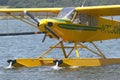 Yellow amphibious seaplane on Lake Casitas, Ojai, California