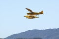 Yellow amphibious seaplane taking off from Lake Casitas, Ojai, California