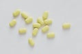 Yellow antibiotics on a white background