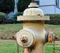 Yellow antique fire hydrant Royalty Free Stock Photo