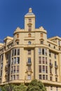 Yellow apartment building at the Tetuan square in Valencia Royalty Free Stock Photo