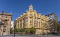 Yellow apartment building at the Tetuan square in Valencia Royalty Free Stock Photo