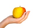 Yellow apple on female palm Royalty Free Stock Photo