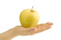 Yellow apple in hand Royalty Free Stock Photo