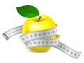 Yellow apple with measuring tape