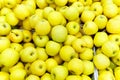 Yellow apples for sale in supermarket. top view organic fruit on the shelves of the hypermarket Royalty Free Stock Photo