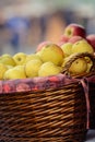 Yellow apples in a wooden basket Royalty Free Stock Photo