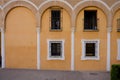 Yellow arches above the balcony window in Seville, Spain, Europe Royalty Free Stock Photo