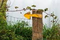 Yellow arrow sign on the Primitive Way Camino Primitivo in Asturias Royalty Free Stock Photo