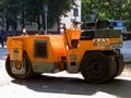 Yellow Asphalt Compactor or Road roller is ready to works for territory improvement.