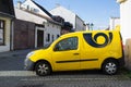 Yellow auto, car and vehicle with sign - Logo and symbol of postal service in Czechia Ceska posta, Czech post