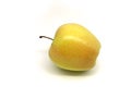 Yellow autumn apple lying on its side Royalty Free Stock Photo