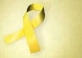 Yellow awareness ribbon