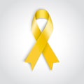 Yellow awareness ribbon on white background. Royalty Free Stock Photo