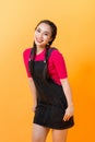 On a yellow background, Asian girl`s various expressions display, embodies the charm of asian girls Royalty Free Stock Photo