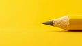 Yellow Background Pencil - Simple, Direct Writing Tool on a Bright Background