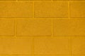 Concrete wall colored with yellow ocher paint Royalty Free Stock Photo