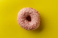 Donut on yellow background. Top view. Copy space. Royalty Free Stock Photo