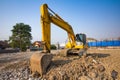 yellow backhoe loader on construction site and work Royalty Free Stock Photo