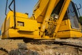 yellow backhoe loader on construction site and work Royalty Free Stock Photo