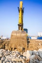 yellow backhoe loader on construction site and work Royalty Free Stock Photo